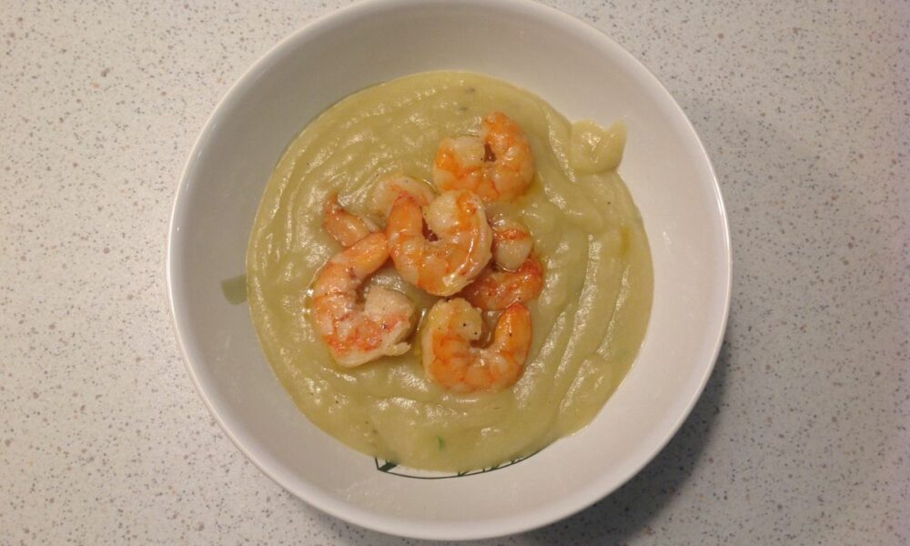 Lactose-free Potage with pumpkin, potatoes, and succulent shrimp